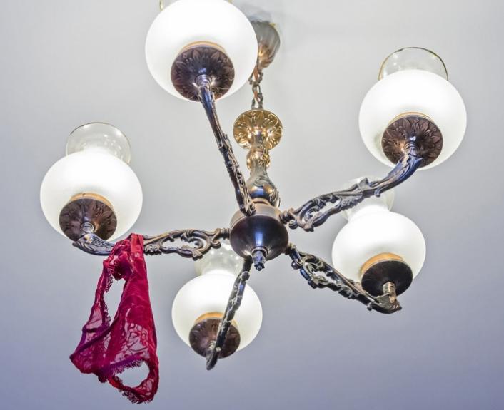 What do red panties on the chandelier mean?