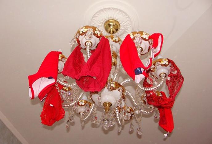 What do red panties on the chandelier mean?