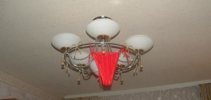 What do red panties on the chandelier mean?