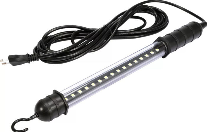 Light wiring in the garage with his hands