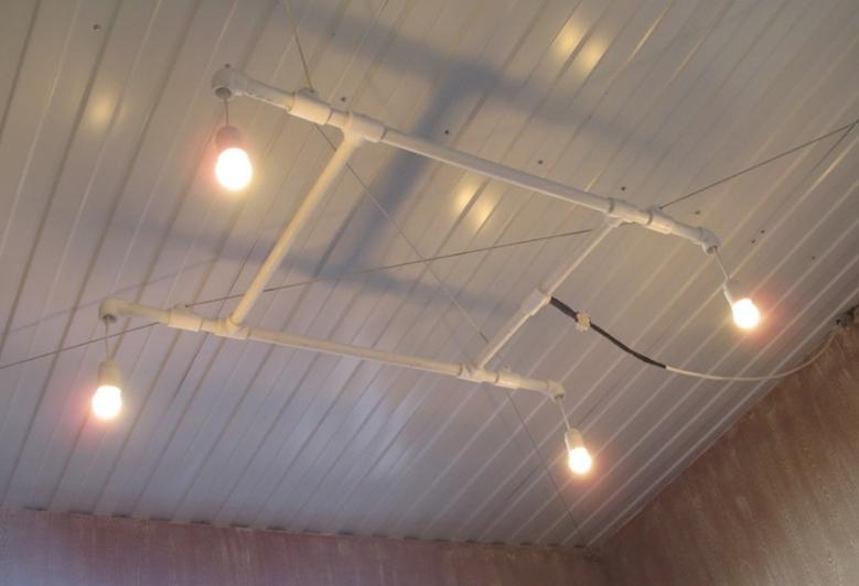 Master of lamps from scraps of pipes with their own hands