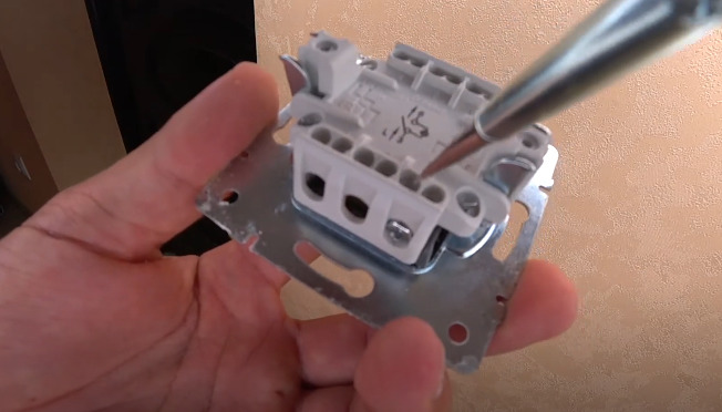 Detailed instruction for taking apart a light switch